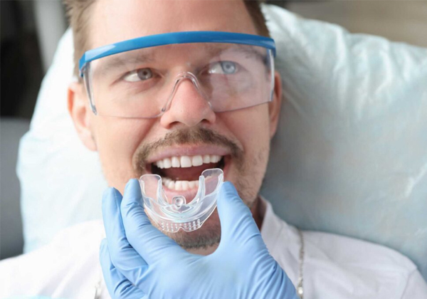 a dental patient fitted with a night guard