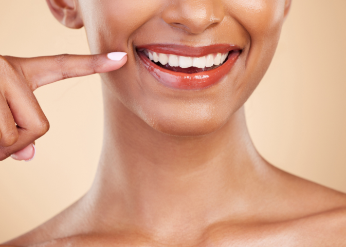 a lady showcasing her stunning white teeth
